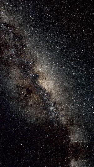 Milky Way Galaxy Core with Dense Star Fields and Dark Dust Lanes in Deep Space HD phone wallpaper