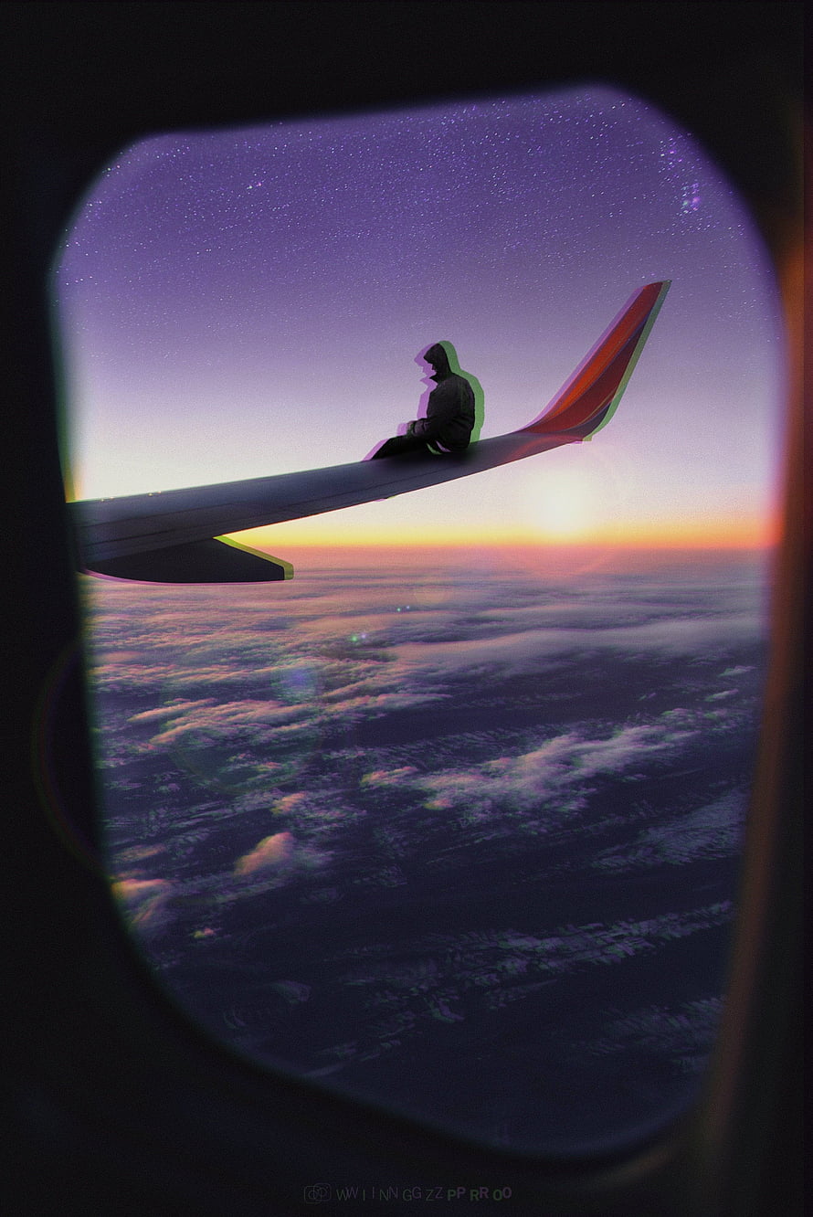 Surreal Digital Art of a Hooded Figure Sitting on an Airplane Wing at Sunset HD phone wallpaper