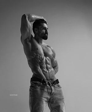 Black and White Studio Portrait of a Muscular Bearded Man in Jeans HD phone wallpaper