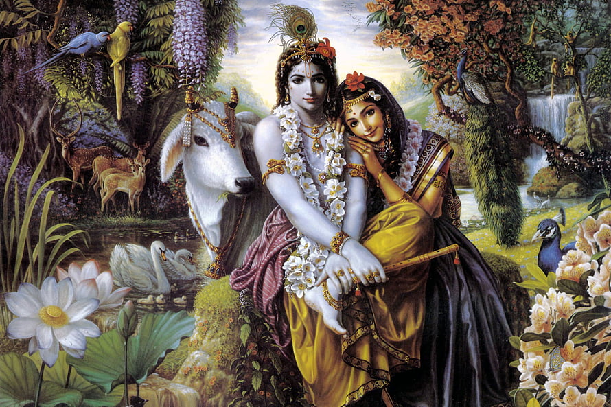 Lord Krishna and Radha in a lush forest with a white cow, lotus flowers, and wildlife HD wallpaper
