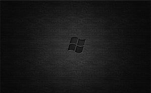 Windows 7 Logo on Dark Textured Background HD wallpaper