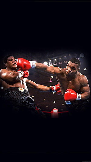 Mike Tyson and Evander Holyfield in a dramatic heavyweight boxing match HD phone wallpaper