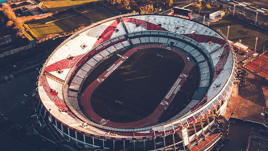 Aerial View of Estadio Monumental Stadium with Red and White Seating HD wallpaper