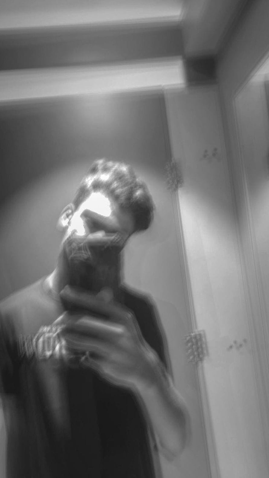 Moody Black and White Mirror Selfie of a Bearded Man in a Dark T-Shirt HD phone wallpaper