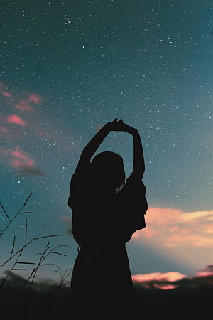 Silhouette of a woman stretching under a starry night sky with pink clouds, Instagram Profile For Girls, instagram dp girl HD phone wallpaper
