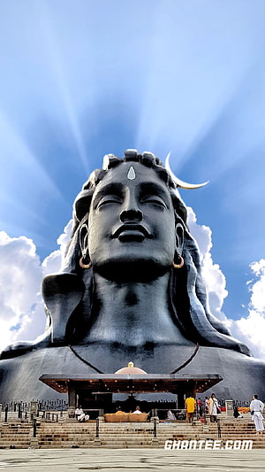 Adiyogi Statue in Dharamshala with Divine Sun Rays and Blue Sky HD phone wallpaper