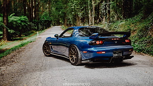 Blue Mazda RX-7 FD3S Rear View on a Forest Road with Custom Bronze Wheels HD wallpaper