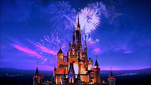 Disney Castle at Night with Fireworks and Purple Sky HD wallpaper