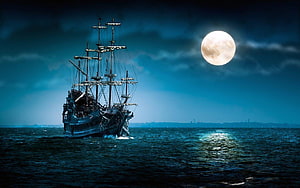 Black Pearl sailing ship on dark ocean under a full moon at night HD wallpaper