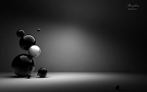 Monochrome 3D Render of Glossy Black Spheres on a Minimalist Gradient Background HD wallpaper