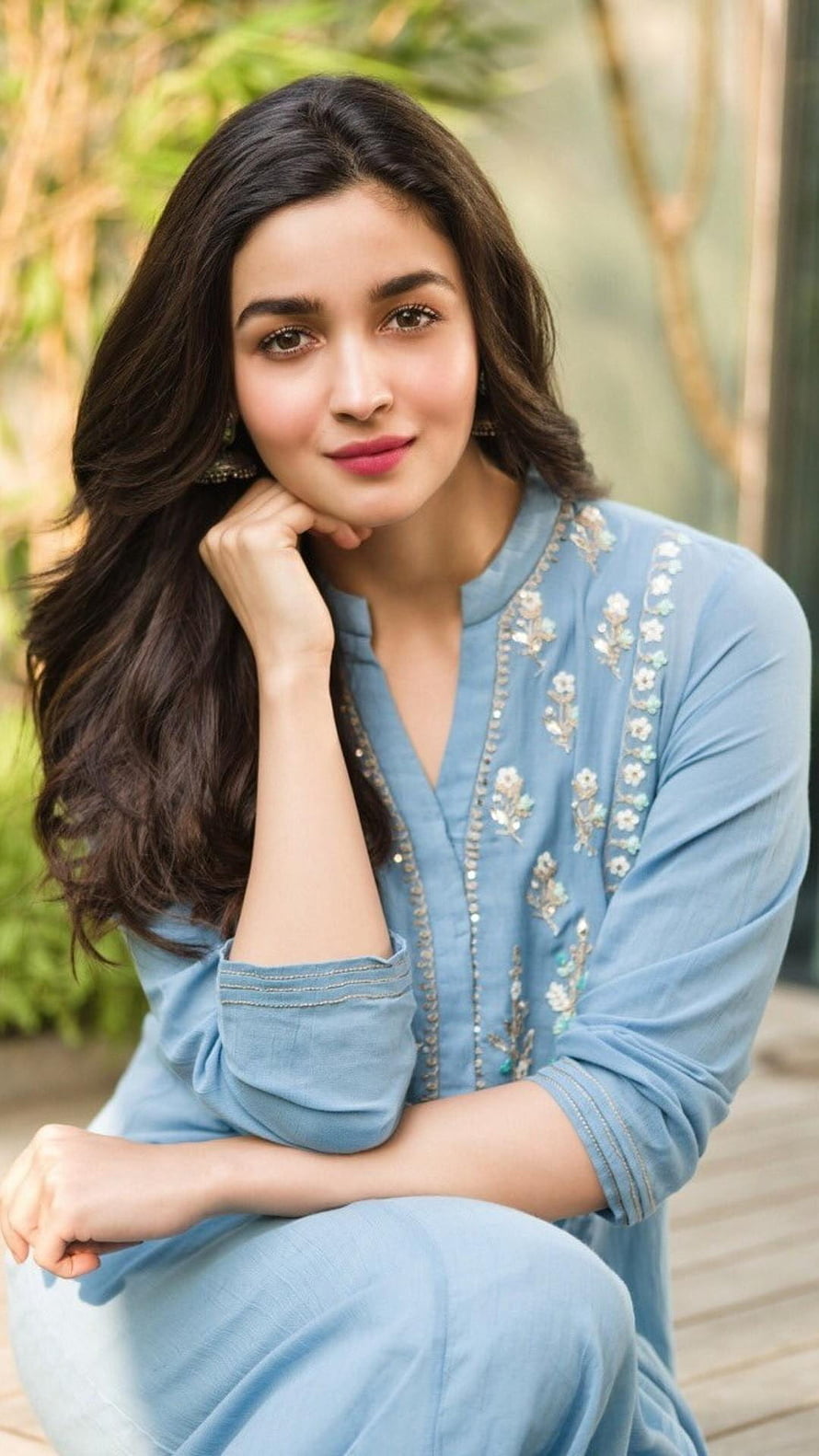 Alia Bhatt in a light blue embroidered kurta with long wavy hair and a soft smile HD phone wallpaper