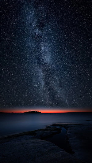 Milky Way Galaxy Rising Over Misty Lake Shore at Twilight HD phone wallpaper