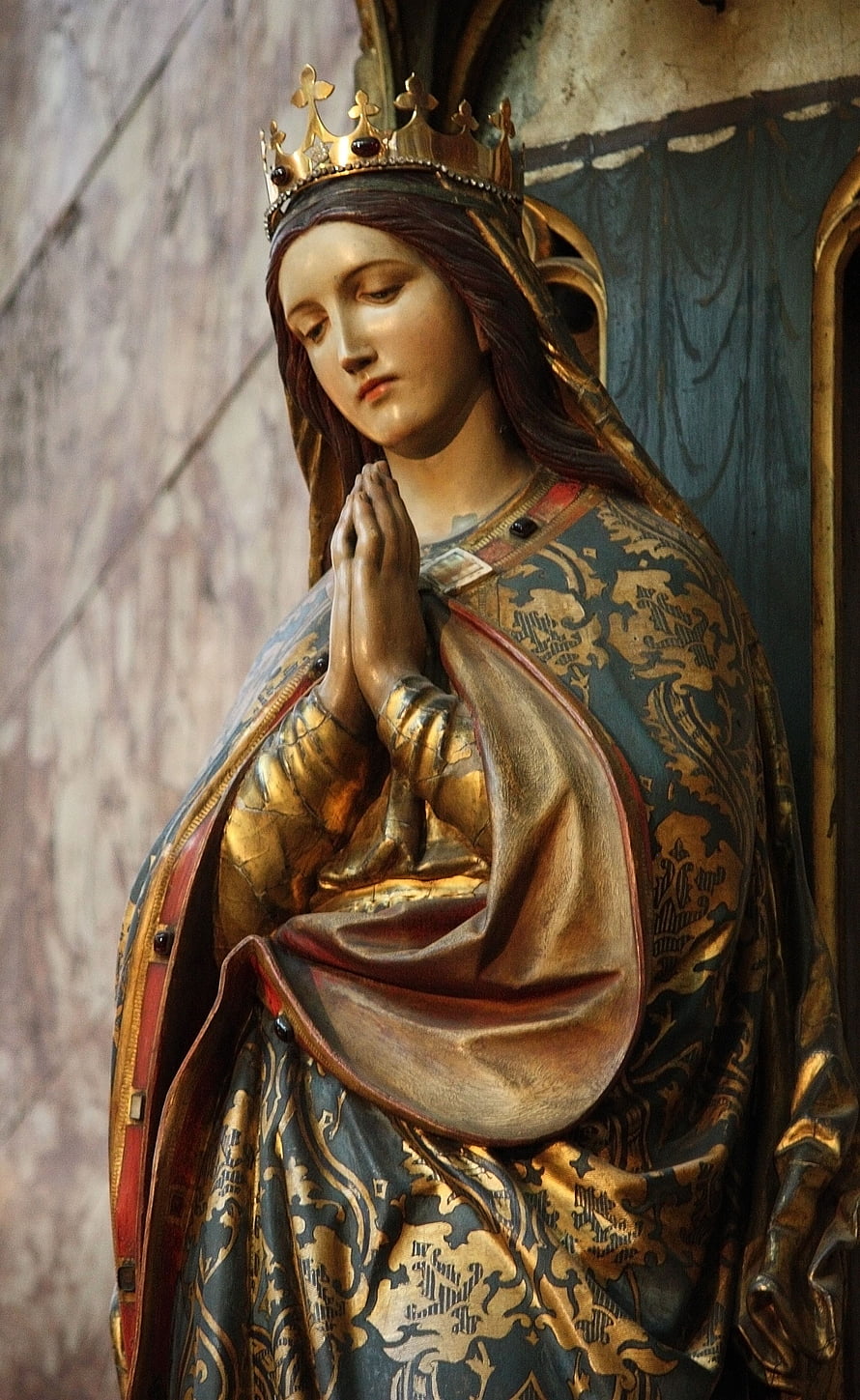 Gilded Virgin Mary Statue in Prayer with Crown and Ornate Robes HD phone wallpaper