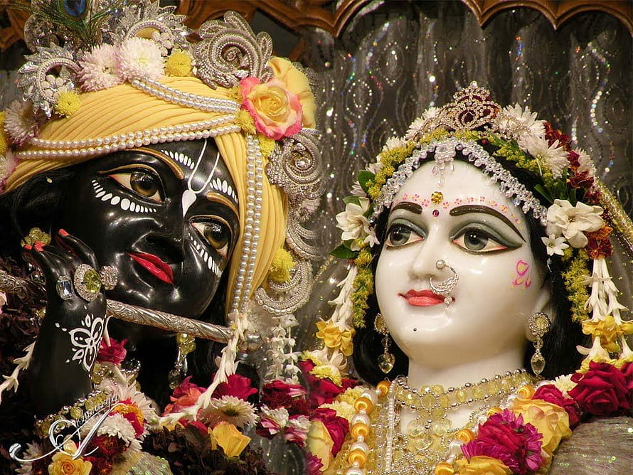 Ornate Hindu Deity Statues Adorned With Flowers And Jewelry In Mayapur Temple HD wallpaper