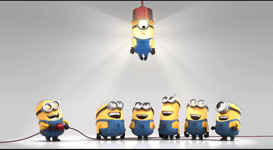 Minions characters in a spotlight scene with one hanging from a wire and others standing in a row HD wallpaper
