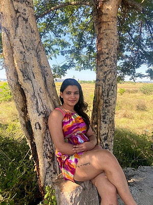 Resmi R Nair Sitting Under Tree In Colorful Dress In Open Field HD phone wallpaper