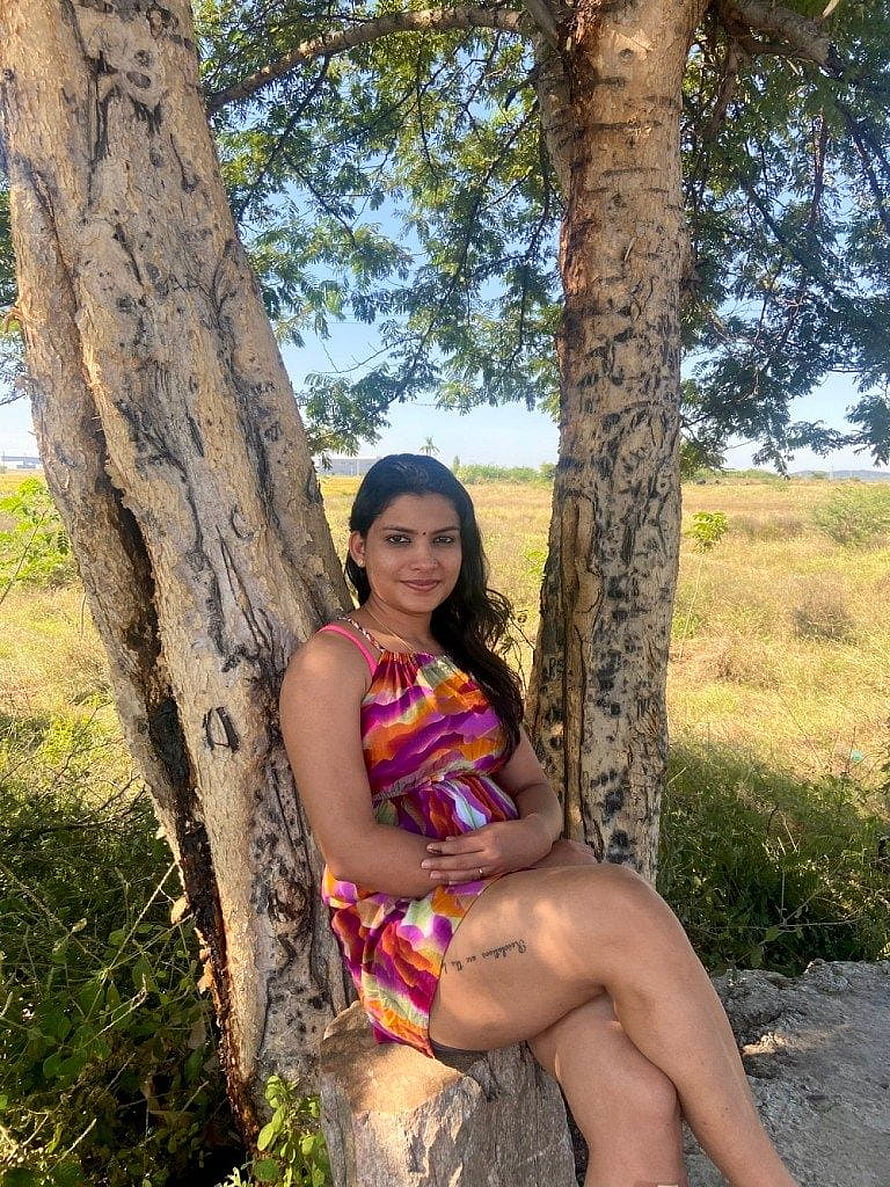 Resmi R Nair Sitting Under Tree In Colorful Dress In Open Field HD phone wallpaper