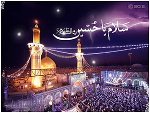 Karbala Shrine at Night with Illuminated Minarets and Crowds HD wallpaper