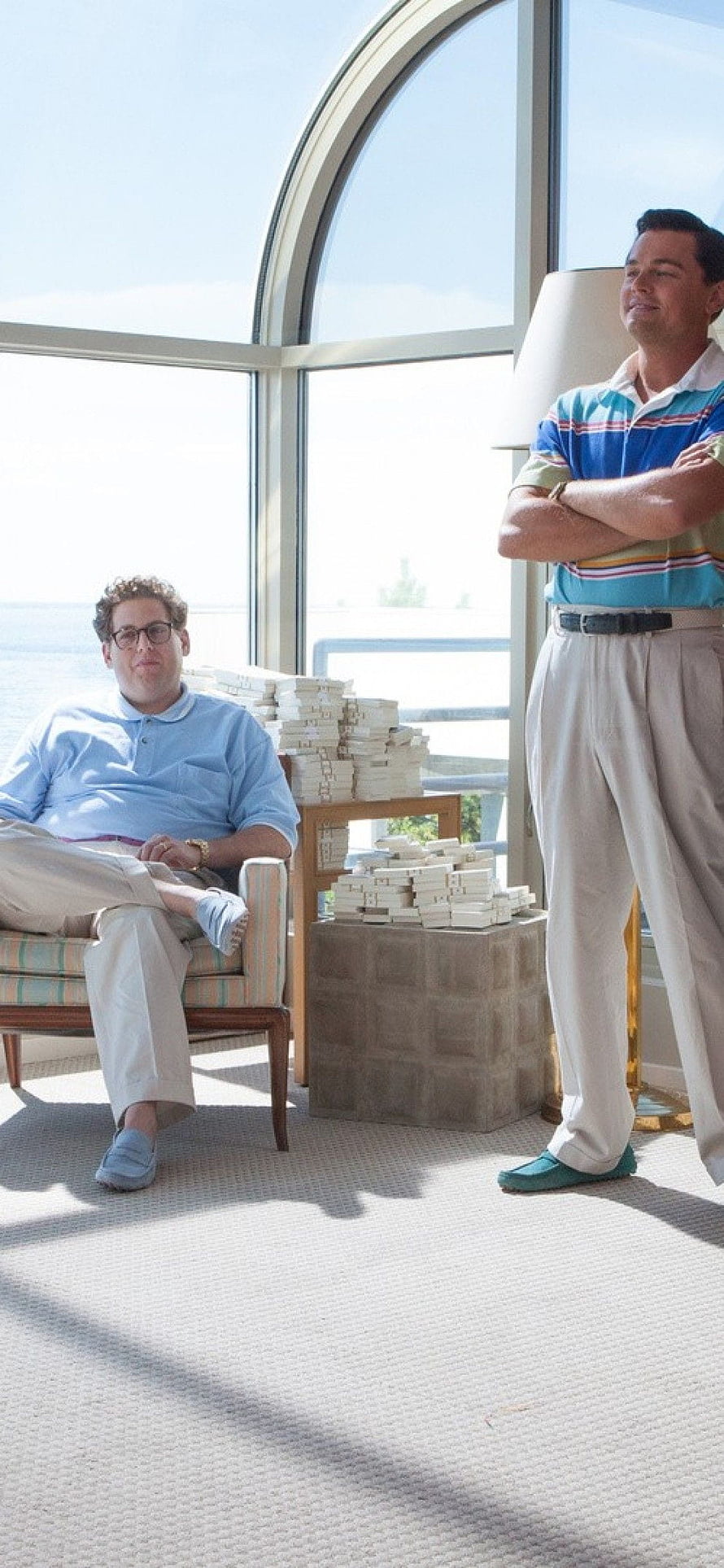 Wolf of Wall Street Movie Scene with Two Men in a Sunlit Room HD phone wallpaper