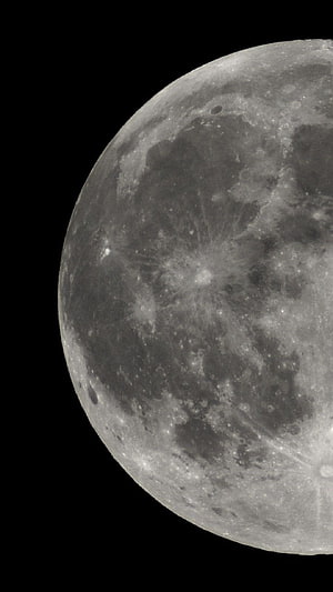 Close-up of the Moon's Cratered Surface Against a Black Sky HD phone wallpaper