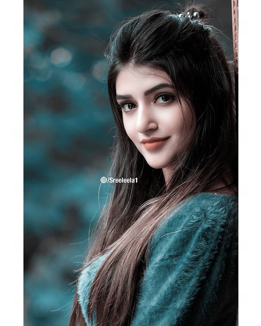 Sree Leela Portrait in Teal Fuzzy Top with Long Dark Hair and Soft Smile HD phone wallpaper