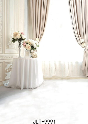 Elegant French Interior with White Drapes and Floral Arrangement on a Round Table HD phone wallpaper