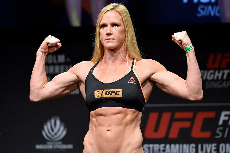 Holly Holm UFC Weigh-In Pose in Black Reebok Sports Bra HD wallpaper
