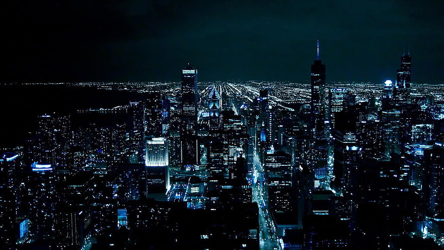 Aerial View of Manhattan Skyline at Night with Deep Blue Tones HD wallpaper