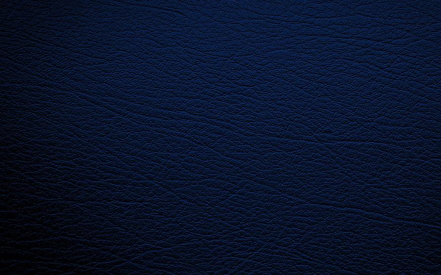 Deep Navy Blue Leather Texture Surface with Natural Grain and Subtle Lighting HD wallpaper