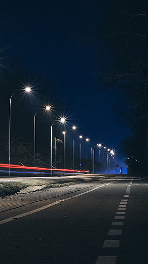 Long Exposure Night Road with Street Lights and Red Blue Light Trails HD phone wallpaper