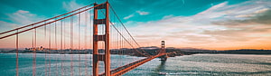 Golden Gate Bridge at Sunset with San Francisco Skyline and Turquoise Sky HD wallpaper