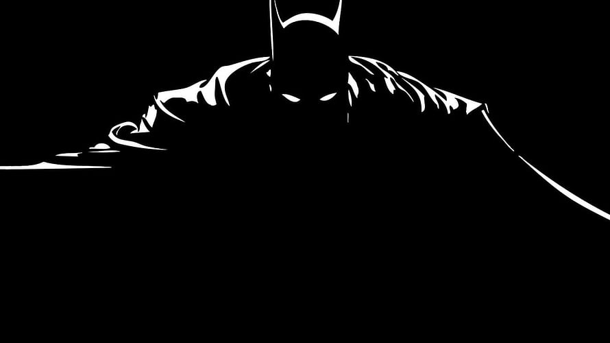 Minimalist Batman Silhouette with Glowing Eyes on Black Background HD wallpaper