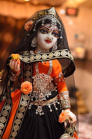 Ornate Indian Bride Doll in Traditional Orange and Black Attire with Gold Jewelry HD phone wallpaper