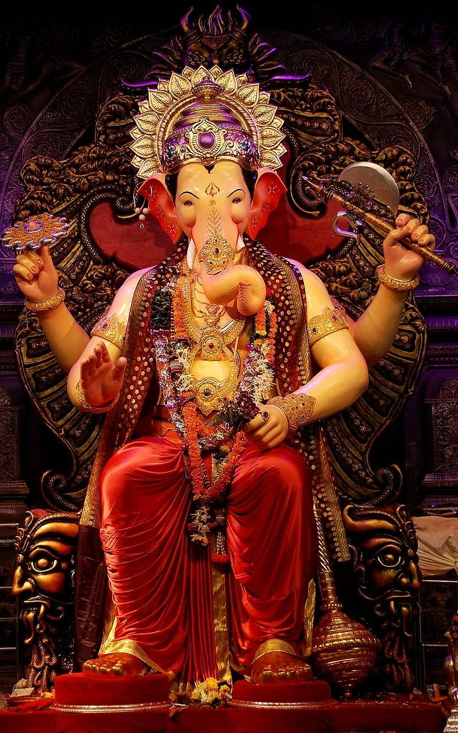 Lord Ganesha Seated on Ornate Throne with Red Drape and Golden Crown HD phone wallpaper
