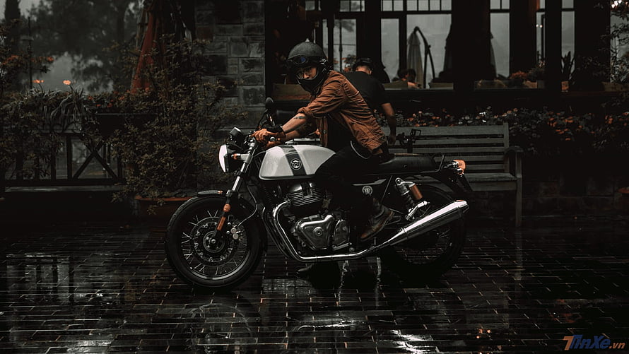Royal Enfield Continental GT 650 Cafe Racer on Wet Cobblestone Street HD wallpaper