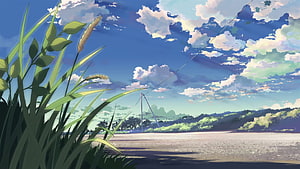 Serene Countryside Landscape with Tall Grass and Wind Turbine Under a Bright Blue Sky HD wallpaper