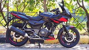Bajaj Pulsar 220F ABS Black and Red Sport Motorcycle Parked Outdoors HD wallpaper