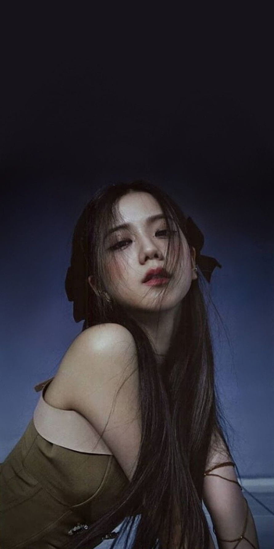 Jisoo moody portrait with dark hair and off-shoulder top against a blue gradient background HD phone wallpaper