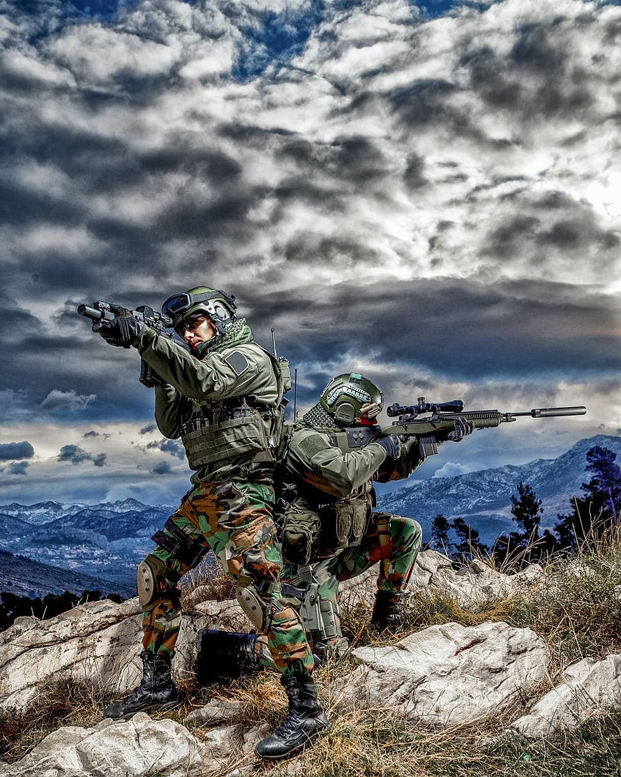 Indian Army Commandos in Tactical Combat Stance on Rocky Mountain Ridge HD phone wallpaper