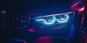 BMW M4 Front Grille and LED Headlights in Neon Blue and Pink Lighting HD wallpaper