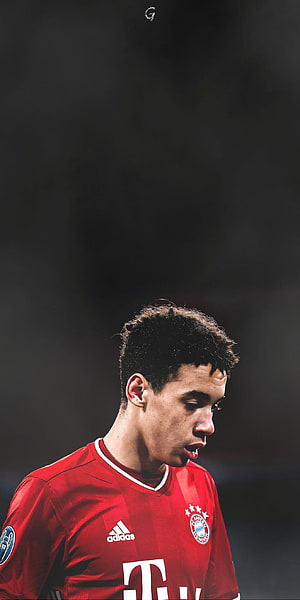 Jamal Musiala in Bayern Munich Red Home Kit with Adidas and T-Mobile Sponsor HD phone wallpaper