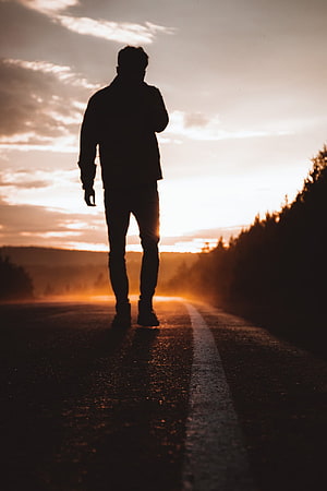 Silhouette of a Man Walking Down a Country Road at Golden Hour Sunset, Man Walking Away, walk away HD phone wallpaper