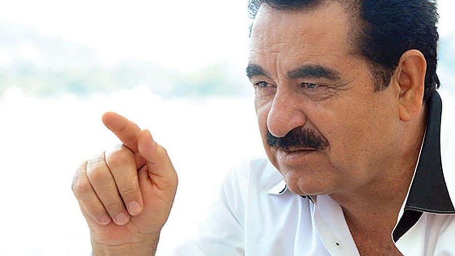 Ibrahim Tatlıses Portrait in White Shirt with Black Collar HD wallpaper