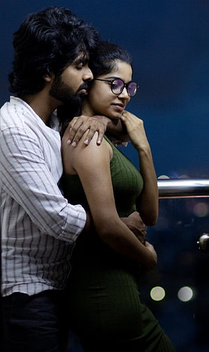 GV Prakash and female co-star in intimate romantic pose from Tamil film still HD phone wallpaper
