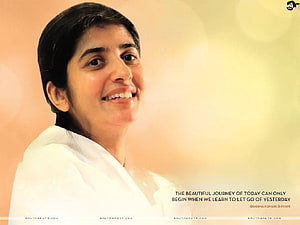 Brahma Kumari Shivani Portrait with Inspirational Quote on Warm Background HD wallpaper