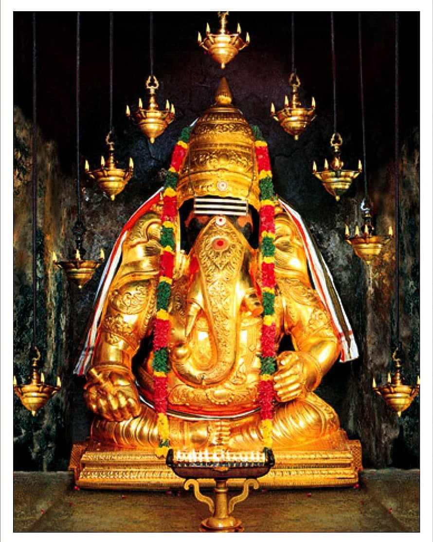 Karpaga Vinayagar Golden Ganesha Idol with Hanging Oil Lamps and Flower Garland HD phone wallpaper