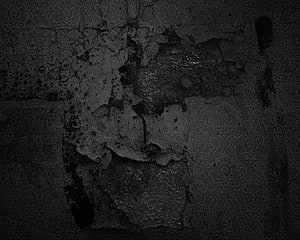 Dark distressed wall texture with peeling damask wallpaper and cracked plaster surface HD wallpaper