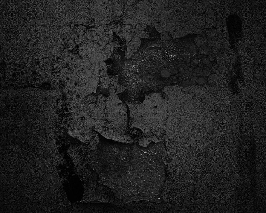 Dark distressed wall texture with peeling damask wallpaper and cracked plaster surface HD wallpaper
