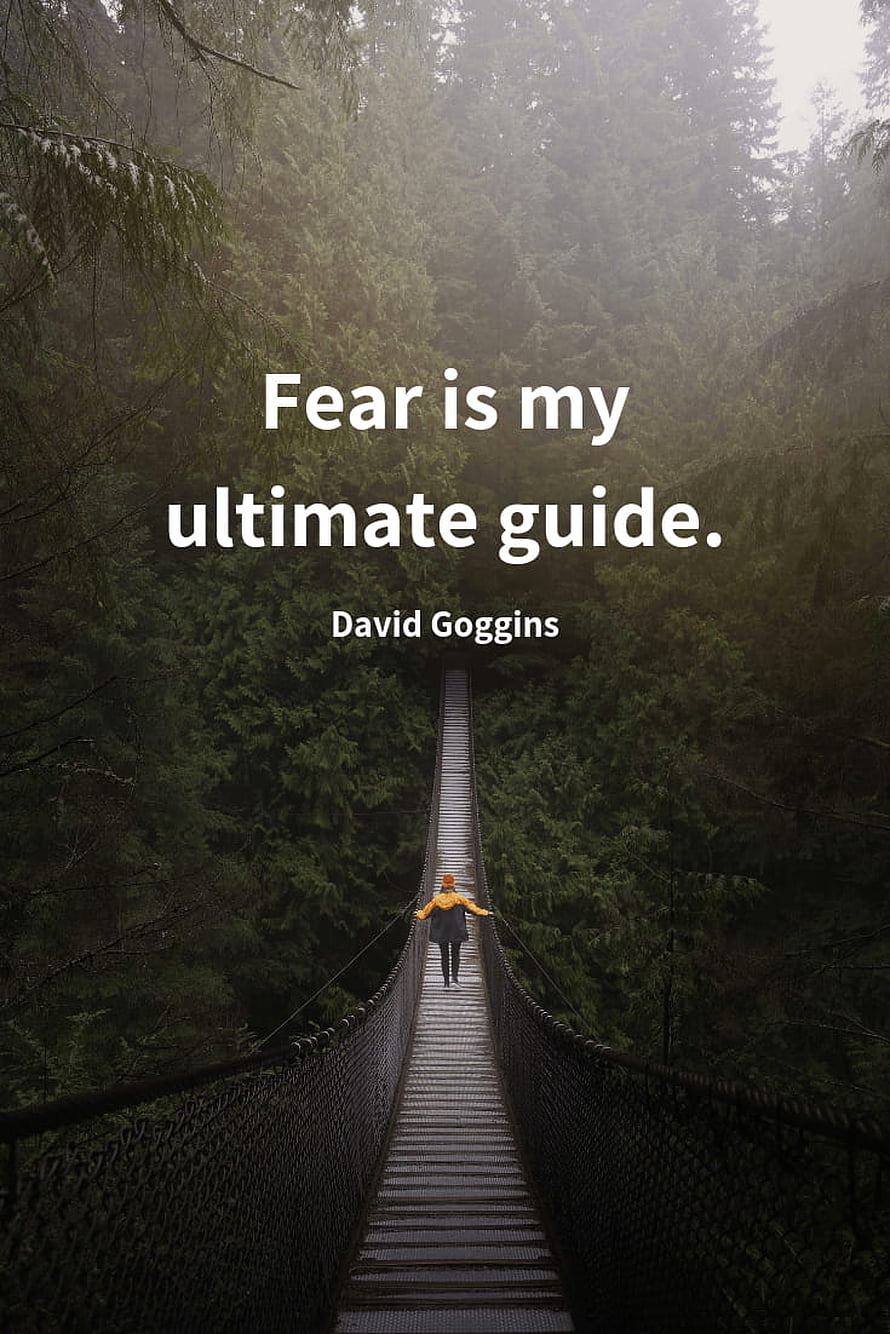 David Goggins Motivational Quote on a Misty Forest Suspension Bridge HD phone wallpaper