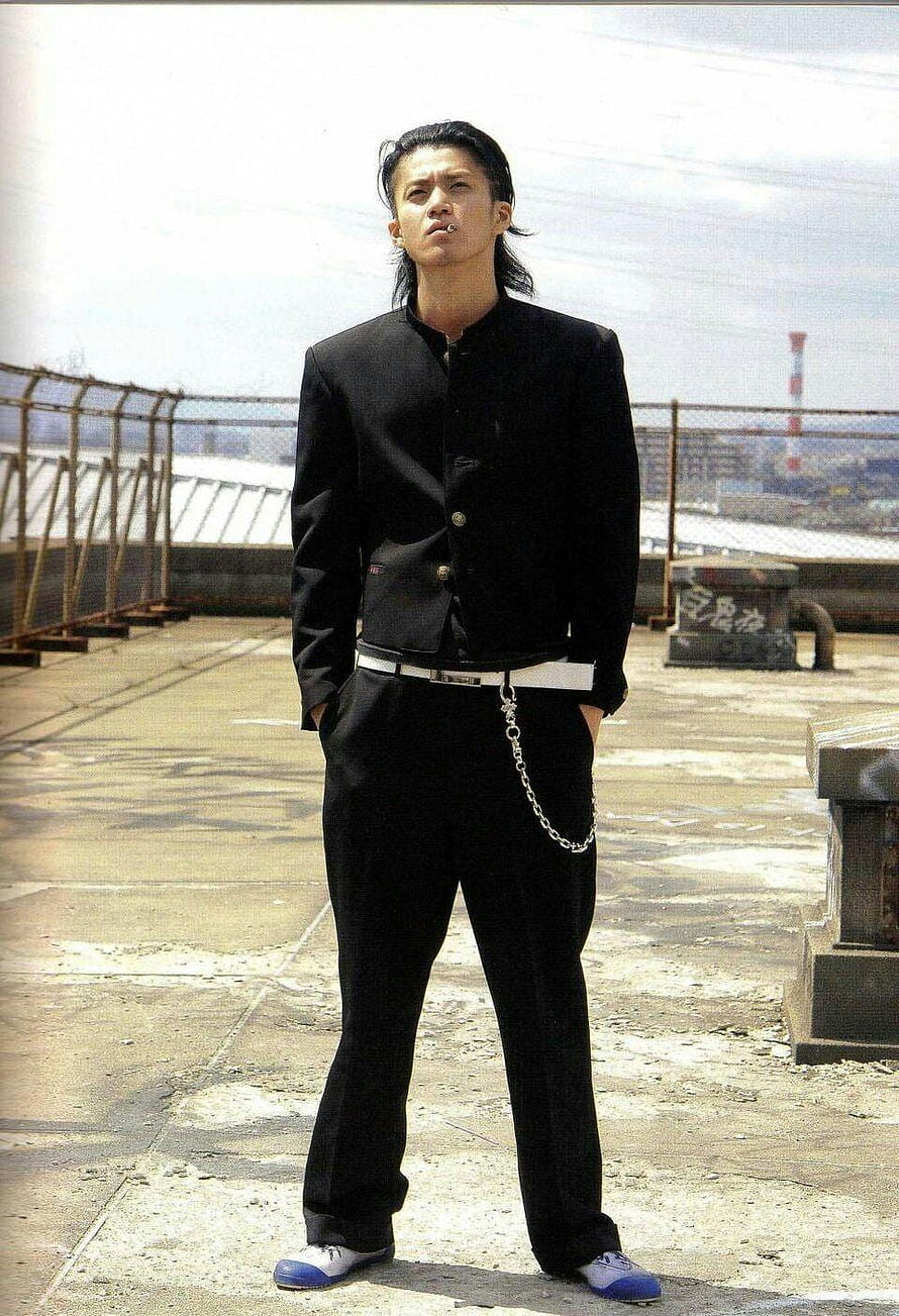 Oguri Shun in Black Suit on Rooftop with Chain Belt HD phone wallpaper